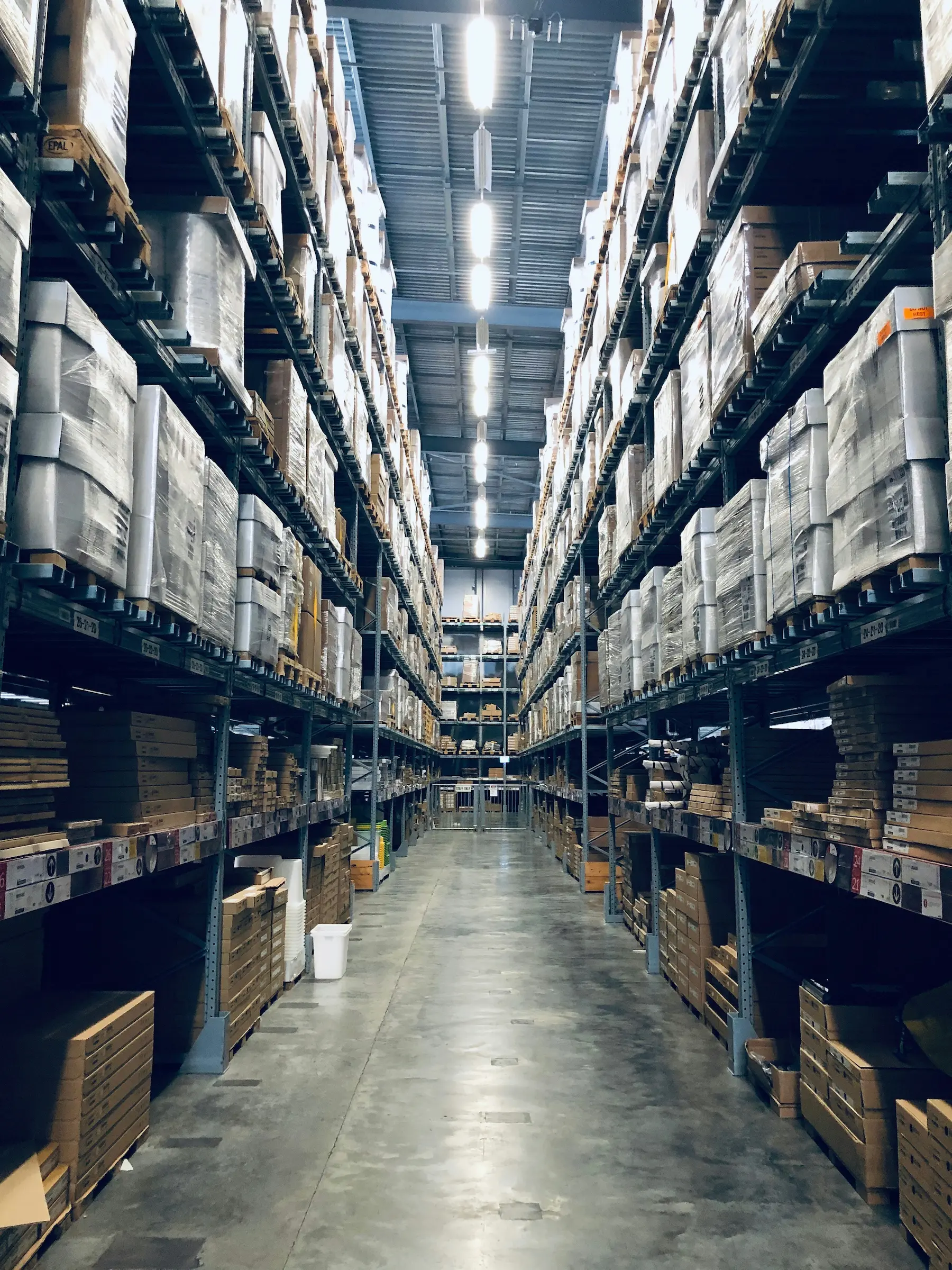 Large industrial warehouse with tall storage racking